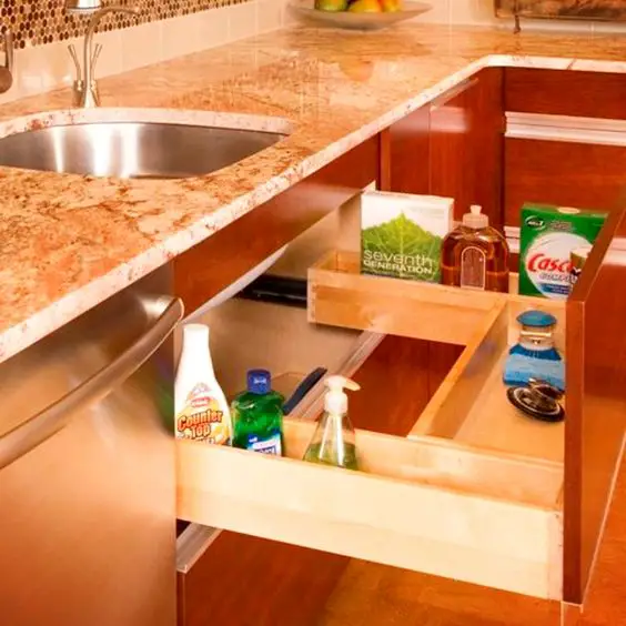 What a great use of space under your kitchen sink to declutter and organize your kitchen #gettingorganized #organizationideasforthehome #getorganized #cleaninghacks #kitchenideas #kitchenorganization #cleaningtricks #organizedhome #diyideas #diyinspiration #organizingtips
