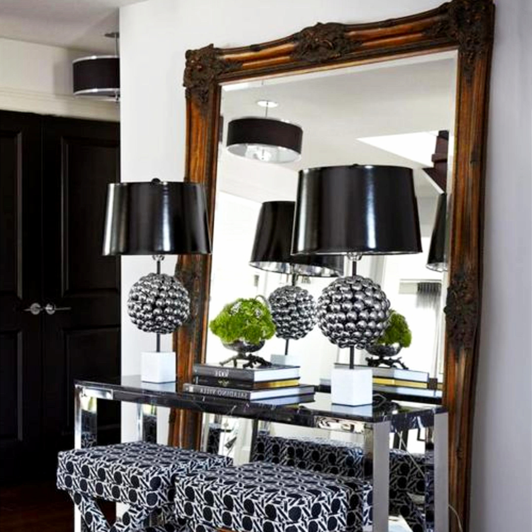 Small front foyer ideas - love the big mirror in this entryway hallway
