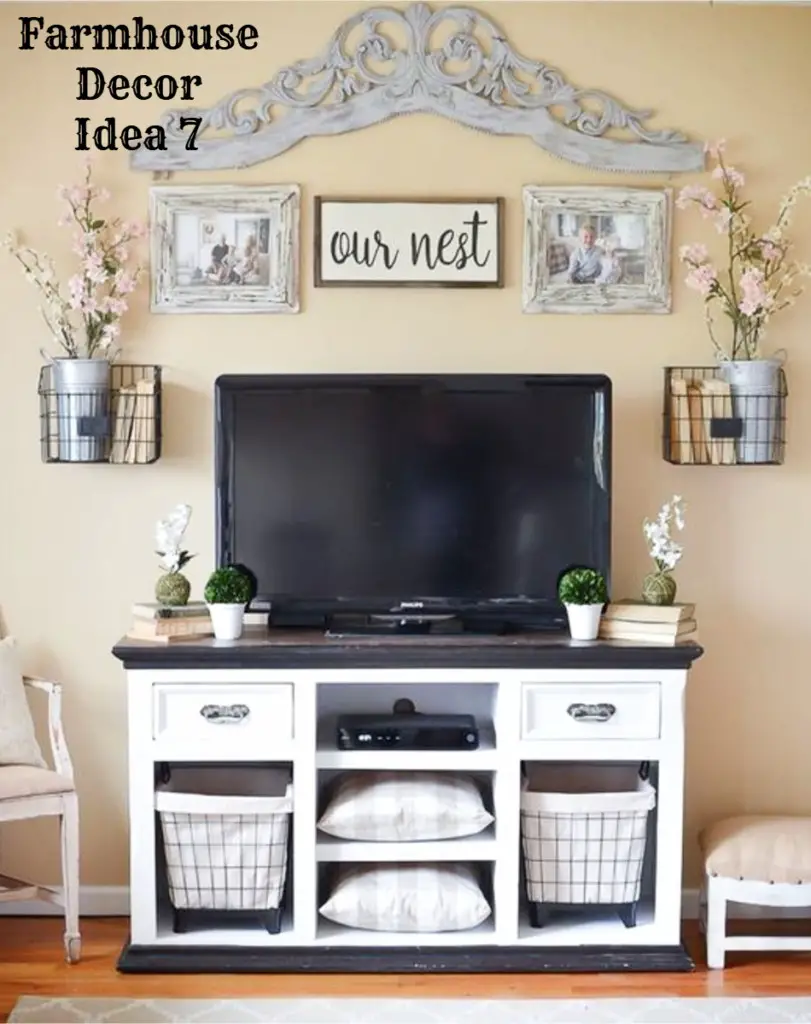 Farmhouse style entertainment cabinet for the living room - love the gallery wall above the tv and that rustic cabinet with baskets is gorgeous - Clutter-free Farmhouse Decor Ideas #farmhousedecorating #rusticfarmhouse #diydecor #homedecorideas #diyhomedecor #farmhousestyle #farmhousedecorideas #decoratingideas #kitchenideas #livingroomideas #bedroomideas #bathroomideas #laundryroomideas